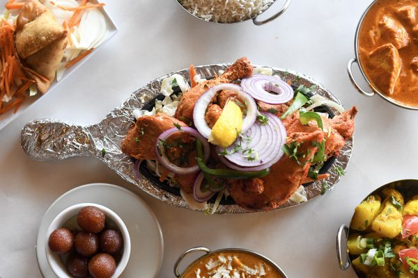 A table full of indian food on a table.