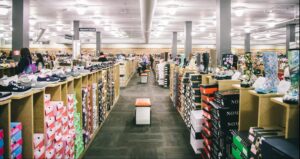 a store filled with lots of shoes and boxes