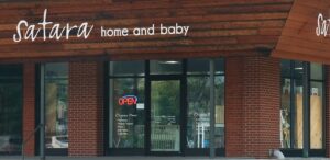 the front of a store with a sign on the front of it