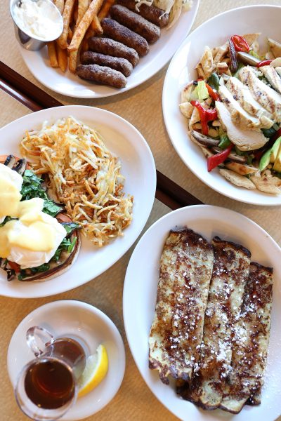 A table with a variety of food on it.